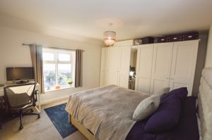 Bedroom One- click for photo gallery